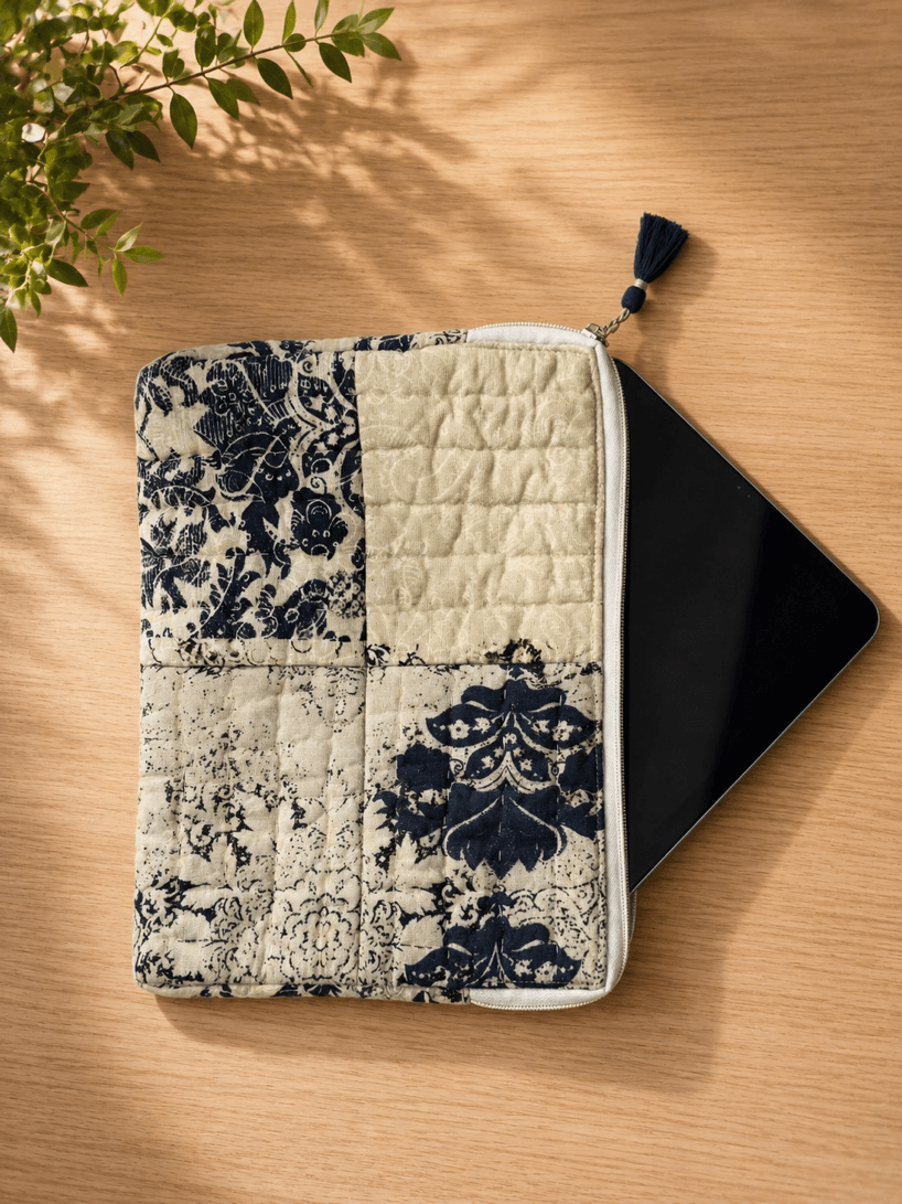 Front of the block printed patchwork iPad cover with a tassel